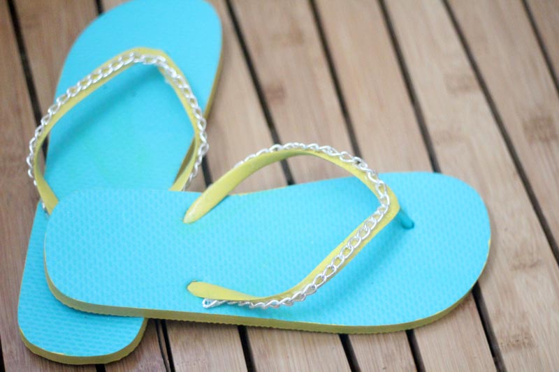 Make your cheap dollar store flip flops look super cool with these DIY flip flops - an easy summer camp craft for teens and tweens - or grown-ups too!