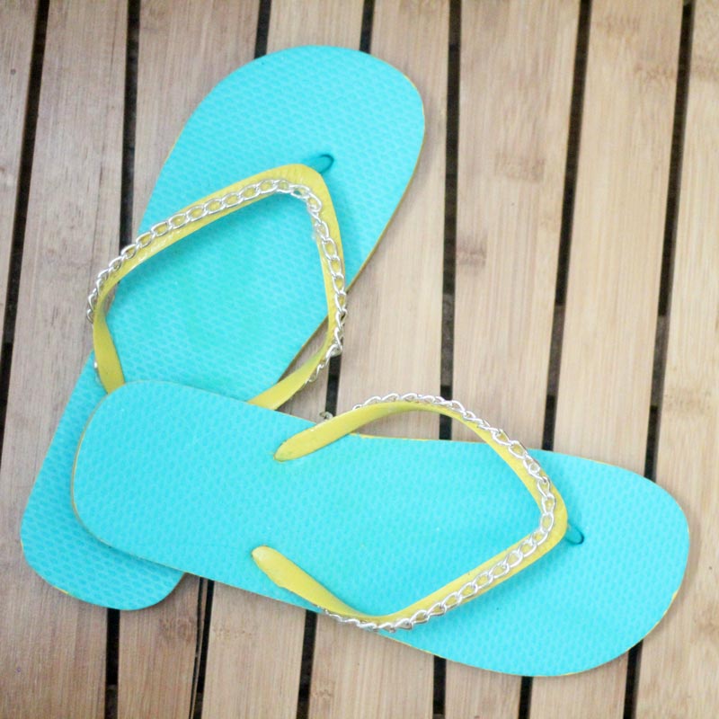 Make your cheap dollar store flip flops look super cool with these DIY flip flops - an easy summer camp craft for teens and tweens - or grown-ups too!