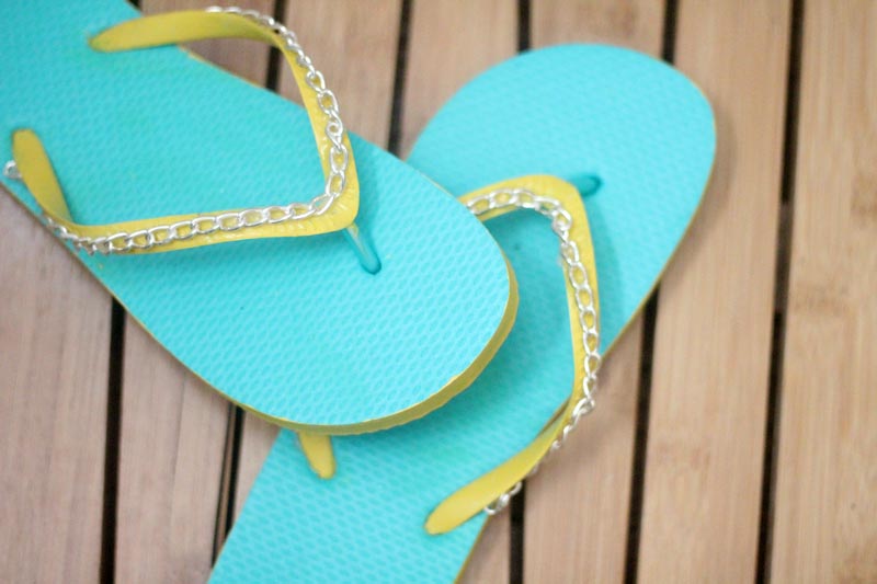 Make your cheap dollar store flip flops look super cool with these DIY flip flops - an easy summer camp craft for teens and tweens - or grown-ups too!