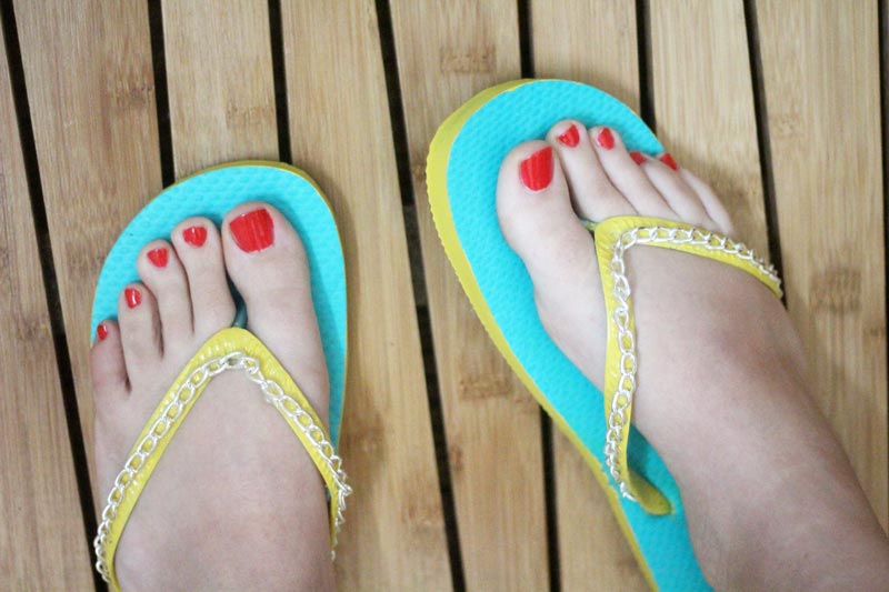 Make your cheap dollar store flip flops look super cool with these DIY flip flops - an easy summer camp craft for teens and tweens - or grown-ups too!