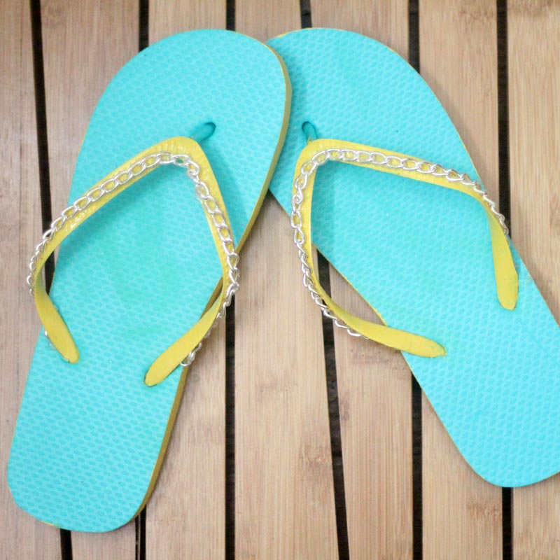 Make your cheap dollar store flip flops look super cool with these DIY flip flops - an easy summer camp craft for teens and tweens - or grown-ups too!