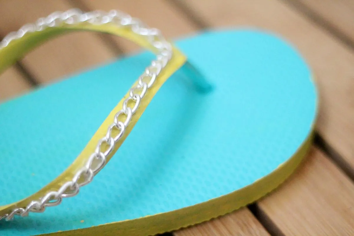 Make your cheap dollar store flip flops look super cool with these DIY flip flops - an easy summer camp craft for teens and tweens - or grown-ups too!