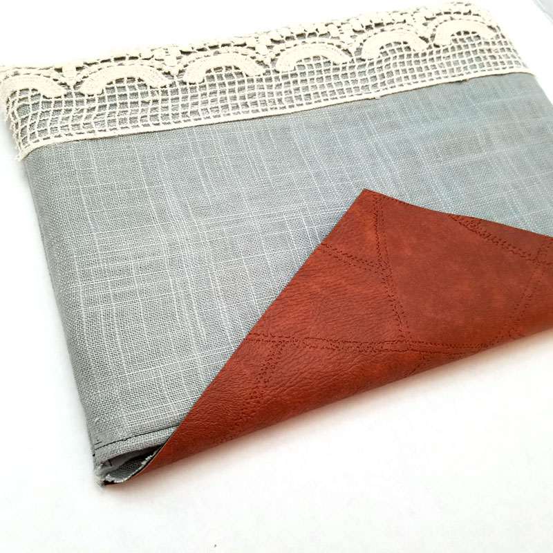 Make an easy DIY laptop sleeve - this quick and easy sewing tutorial for a laptop or tablet case has beautiful linen and leatherette detail! The leather gives it a bright touch, the lace makes it a bit feminine. You'll love it! No pattern needed - fits with any size computer notebook! I made it for a Surface Pro 4.