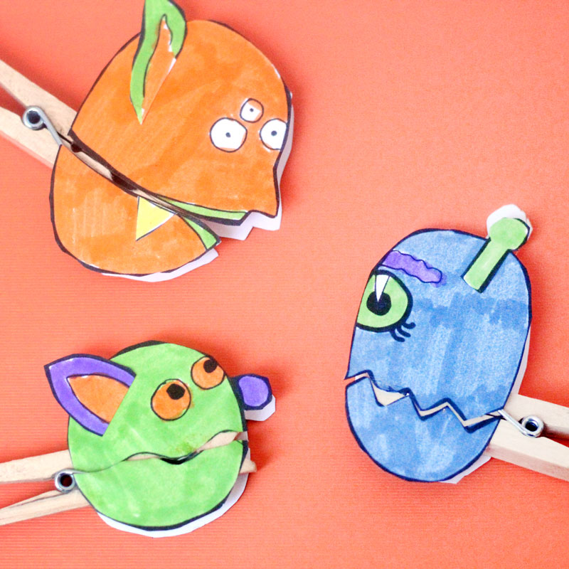 Make these adorable monster clothespin puppets using the free printable template - and then play "Feed the Monster" - a fun fine motor activity and game to help improve pincer grasp! You'll love this paper craft and free printable activity for kids. It's also great for Halloween crafts but fun for year-round too.