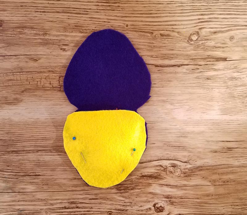 Make this DIY fidget spinner case to protect your fidget toy and keep it a bit farther out of reach of babies! It's an easy beginner felt sewing project that an adult or a child can make, plus it has a built in zipper fidget too! Free template / pattern included.