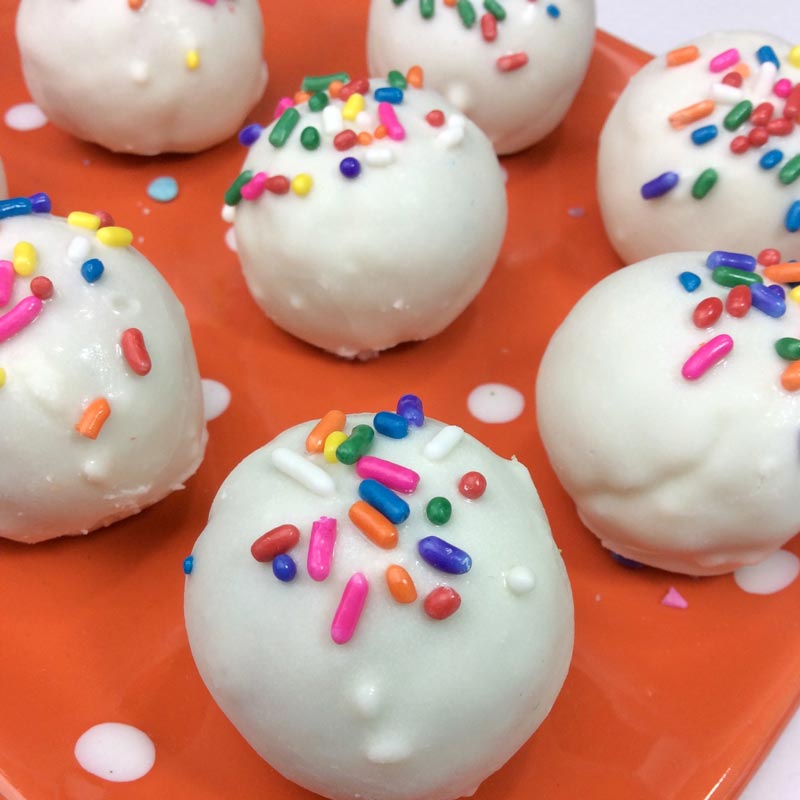 Funfetti cake balls are the perfect recipe for a unicorn or mermaid themed birthday party - or any party! They are also perfect for baking and cooking with kids and a fun treat.