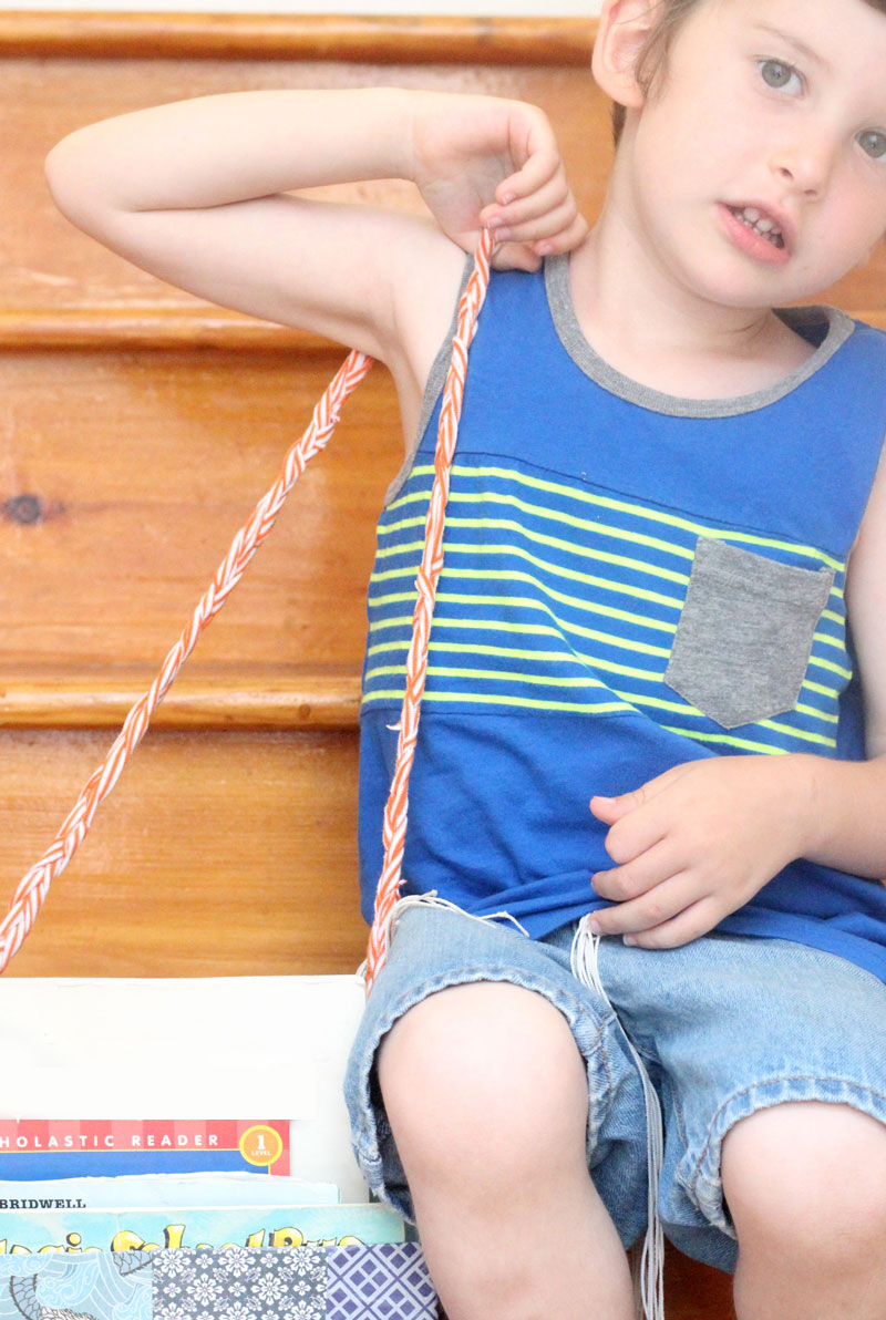 Make this DIY book tote from a recycled cereal box to transport books from the bookshelf to the reading nook! I love this idea because we have a few reading corners in our home, and it's a great way to keep things organized and neat. 