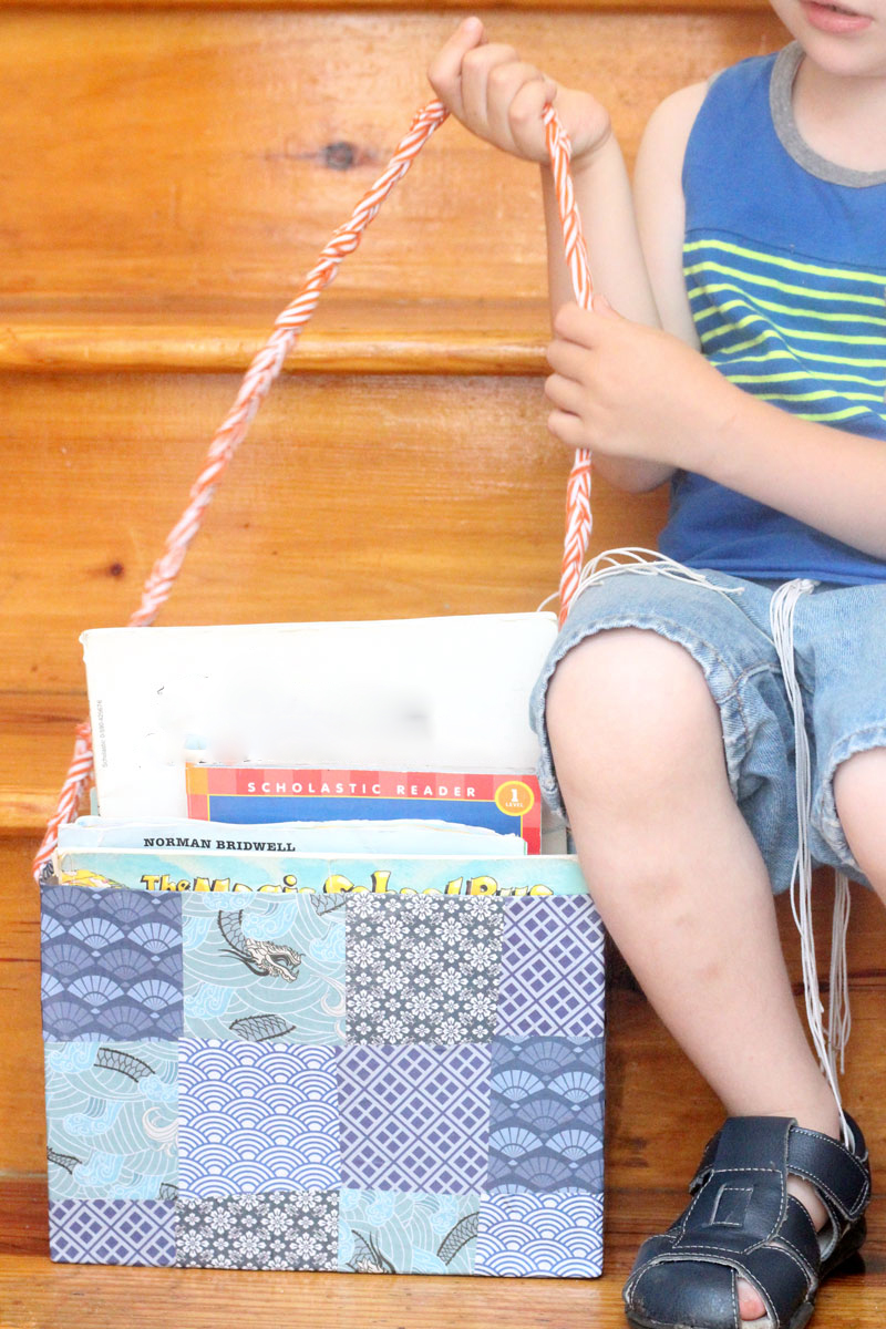 Make this DIY book tote from a recycled cereal box to transport books from the bookshelf to the reading nook! I love this idea because we have a few reading corners in our home, and it's a great way to keep things organized and neat. 