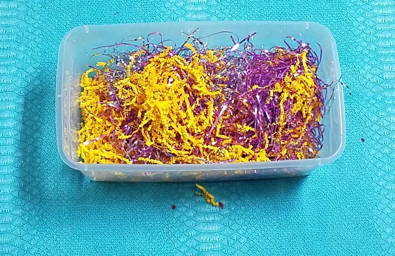 A cutting practice sensory bin that's a perfect way to entertain your preschooler and drink that coffee! This occupational therapy idea and scissors practice activity for preschoolers is perfect for preparing for kindergarten, or just to keep young kids busy.