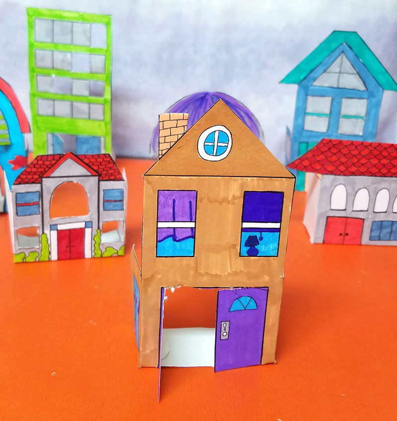 Print and color these fun paper houses and then play with them! This color-in paper craft for kids and adults is easy to create, open-ended and really entertaining! It's a great rainy day activity for preschoolers too and a unique coloring page and papercraft.