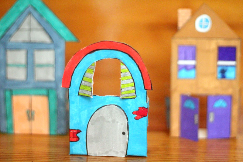 Print and color these fun paper houses and then play with them! This color-in paper craft for kids and adults is easy to create, open-ended and really entertaining! It's a great rainy day activity for preschoolers too and a unique coloring page and papercraft.