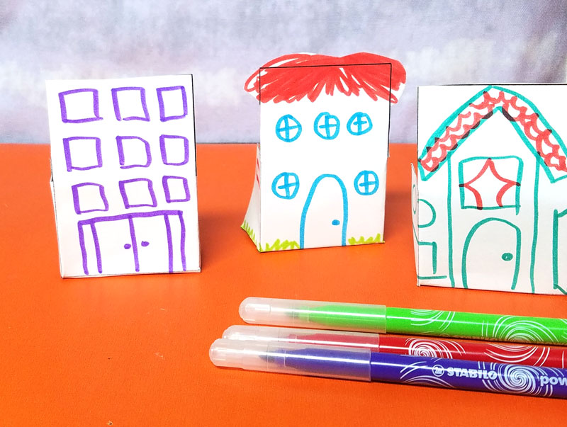 Print and color these fun paper houses and then play with them! This color-in paper craft for kids and adults is easy to create, open-ended and really entertaining! It's a great rainy day activity for preschoolers too and a unique coloring page and papercraft.