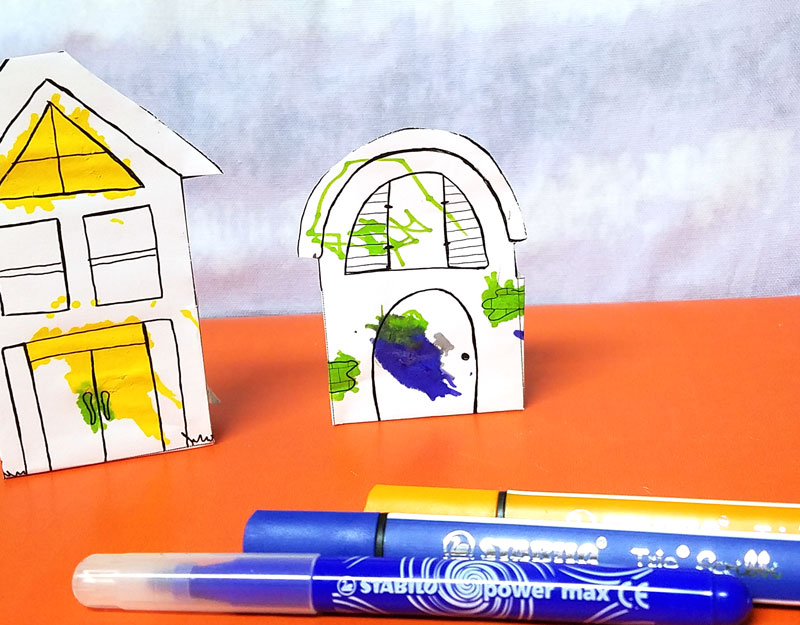 Print and color these fun paper houses and then play with them! This color-in paper craft for kids and adults is easy to create, open-ended and really entertaining! It's a great rainy day activity for preschoolers too and a unique coloring page and papercraft.