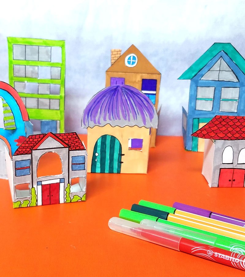 Print and color these fun paper houses and then play with them! This color-in paper craft for kids and adults is easy to create, open-ended and really entertaining! It's a great rainy day activity for preschoolers too and a unique coloring page and papercraft.