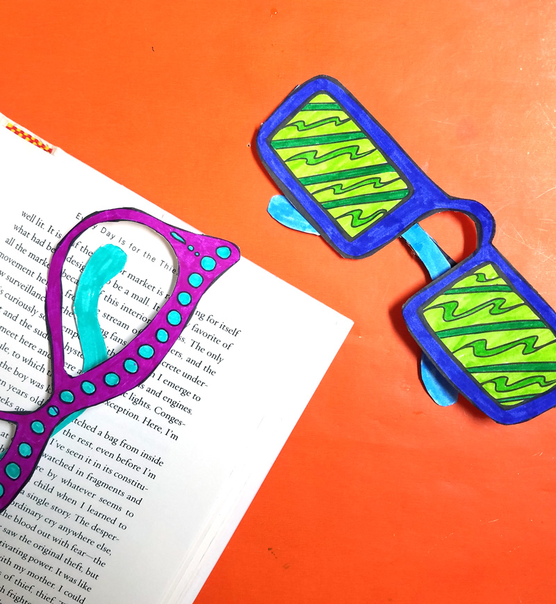 Print and craft these free printable "reading glasses" coloring bookmarks - these cool bookmarks coloring pages for adults (and kids too!) are a fun paper craft and boredom buster! These magnetic DIY bookmarks stay in place and are so much fun to create!