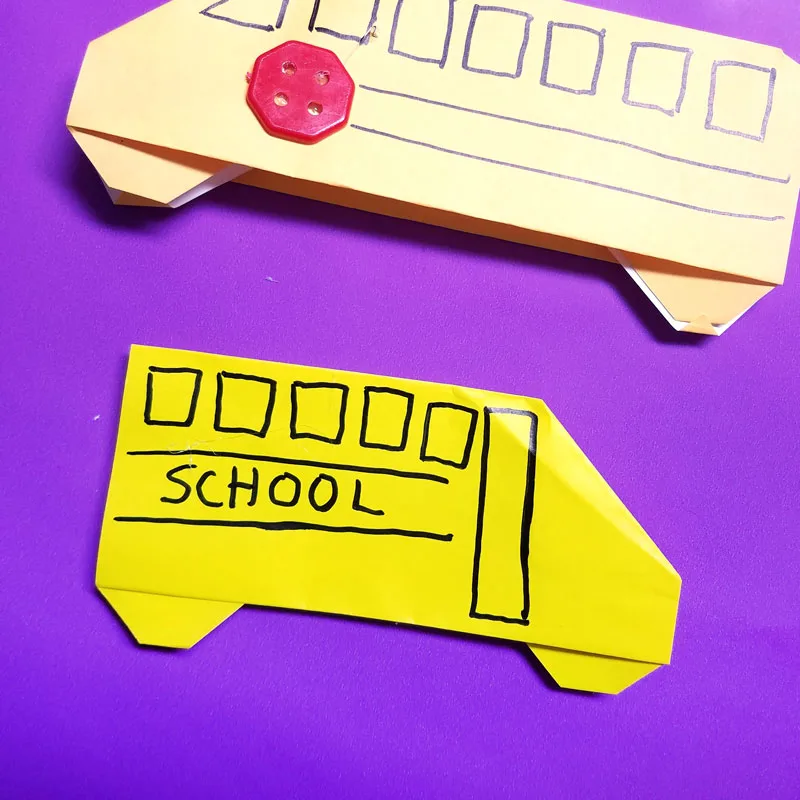 Make an origami bus - an adorable little school bus paper craft for kids - it is totally an origami tutorial for beginners and super easy. Use it to embellish any back to school craft. #backtoschool #papercraft #origami
