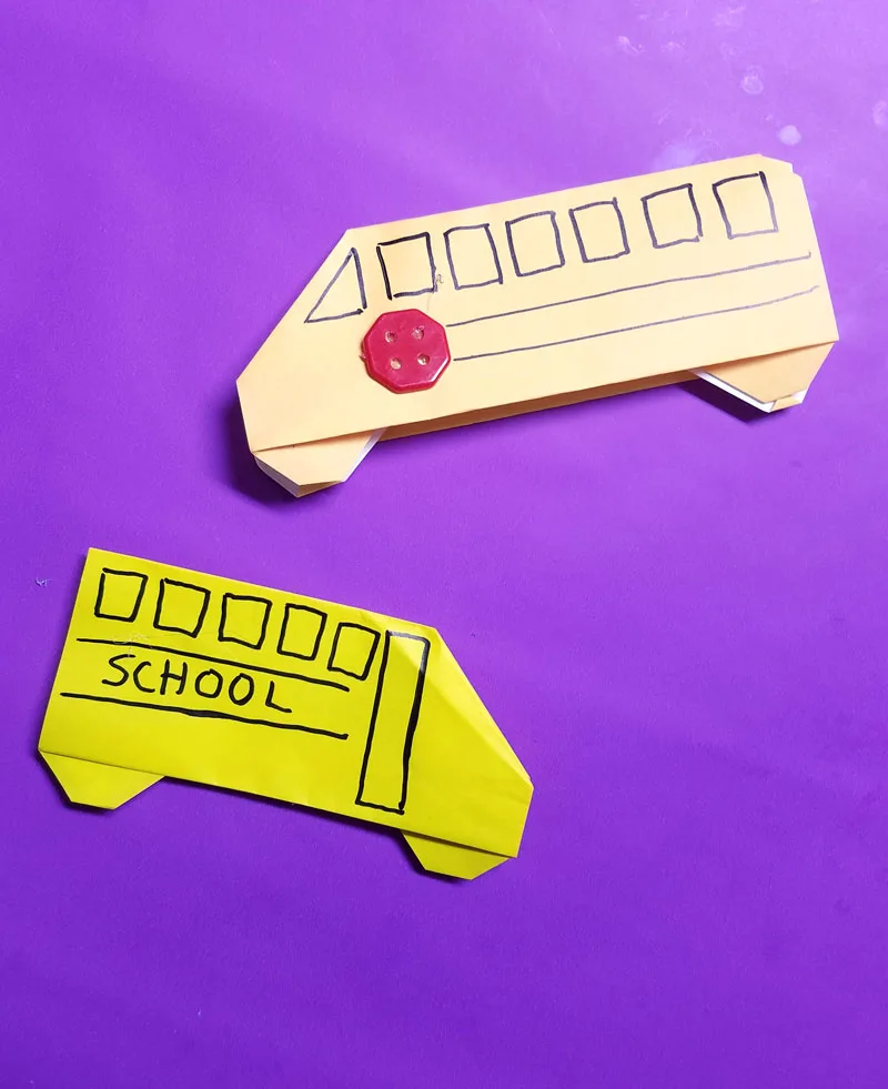 Make an origami bus - an adorable little school bus paper craft for kids - it is totally an origami tutorial for beginners and super easy. Use it to embellish any back to school craft. #backtoschool #papercraft #origami