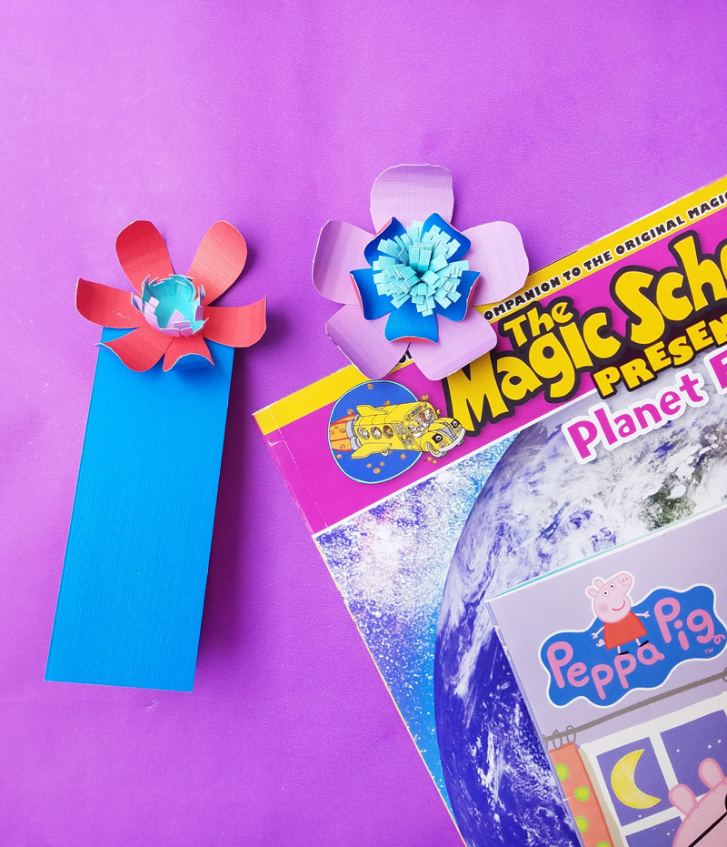 Craft these beautiful paper flower bookmarks - an easy paper craft for kids and teens! You'll love these easy DIY flowers made from cardstock and placing them on a bookmark helps kids love to read and promotes literacy.