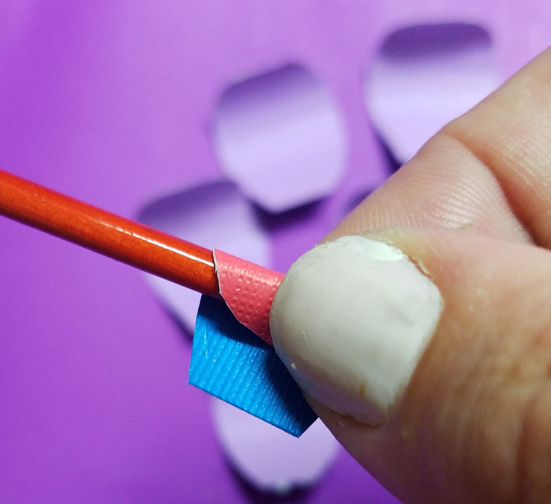 Craft these beautiful paper flower bookmarks - an easy paper craft for kids and teens! You'll love these easy DIY flowers made from cardstock and placing them on a bookmark helps kids love to read and promotes literacy.