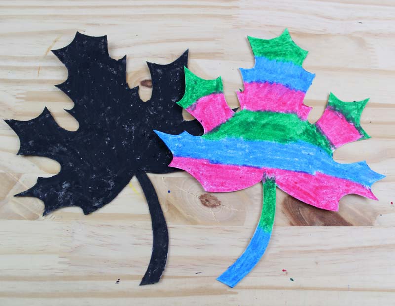 Make this beautiful scratch art fall leaf craft - a beautiful and easy autumn paper craft for kids! Includes a free printable template.