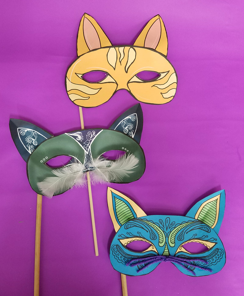 These cat masks printables are so beautiful and easy to make! You'll love the final result. It's cool as a halloween papercraft or for any time of year. These papercraft masks are available as adult coloring pages or as color-in crafts for kids, or even as a full color printable paper craft - and it's easy too!