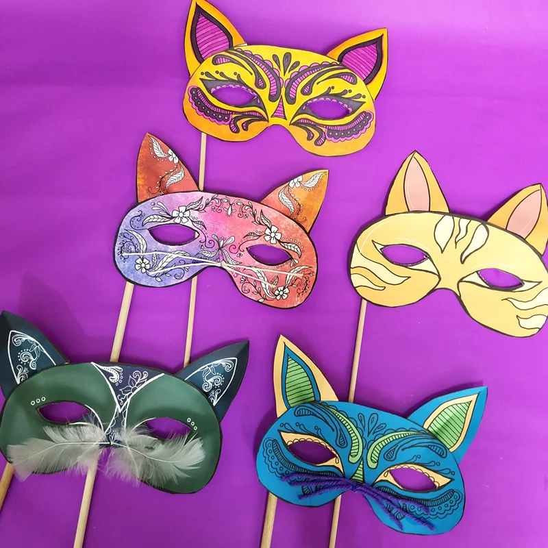 These cat masks printables are so beautiful and easy to make! You'll love the final result. It's cool as a halloween papercraft or for any time of year. These papercraft masks are available as adult coloring pages or as color-in crafts for kids, or even as a full color printable paper craft - and it's easy too!