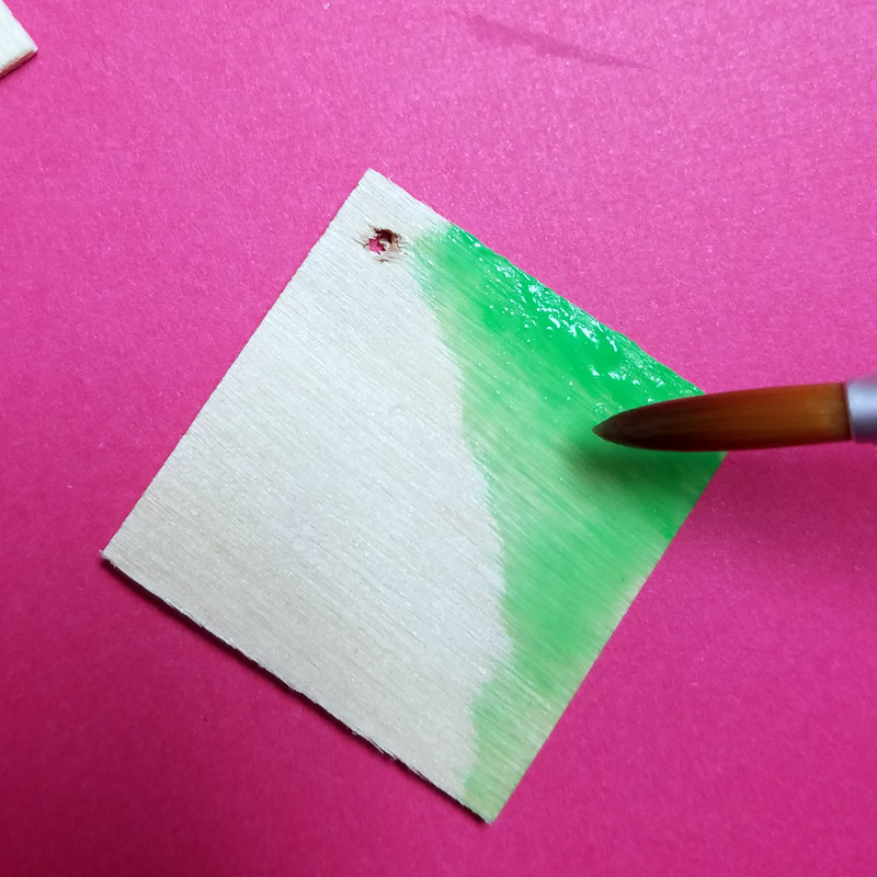 Make these stunning DIY earrings with a watercolor finish and some cool doodles! You'll love this beginner jewelry making project for teens and tweens to enjoy.