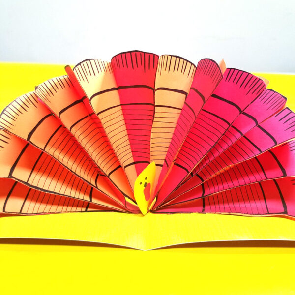 These free printable turkey feathers are so versatile and perfect for yoru Thanksgiving crafts for adults and for kids! You can make a pop up card with them or any Thanksgiving turkey paper craft