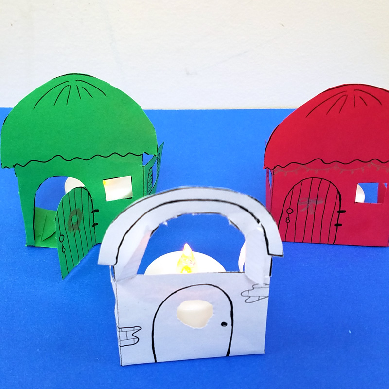 Make these super easy Christmas paper houses - a free printable and a cool paper craft for teens, tweens, and adults.