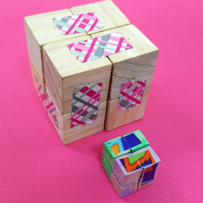 Make this wooden DIY infinity cube - an addictive fidget toy for kids and grown-ups! You'll love this DIY fidget spinner craft alternative - it's great for antsy kids and adult swho need to do something with their hands #fidgettoy #fidgetspinner #infinitycube #diytoy #fidget #diy #craft