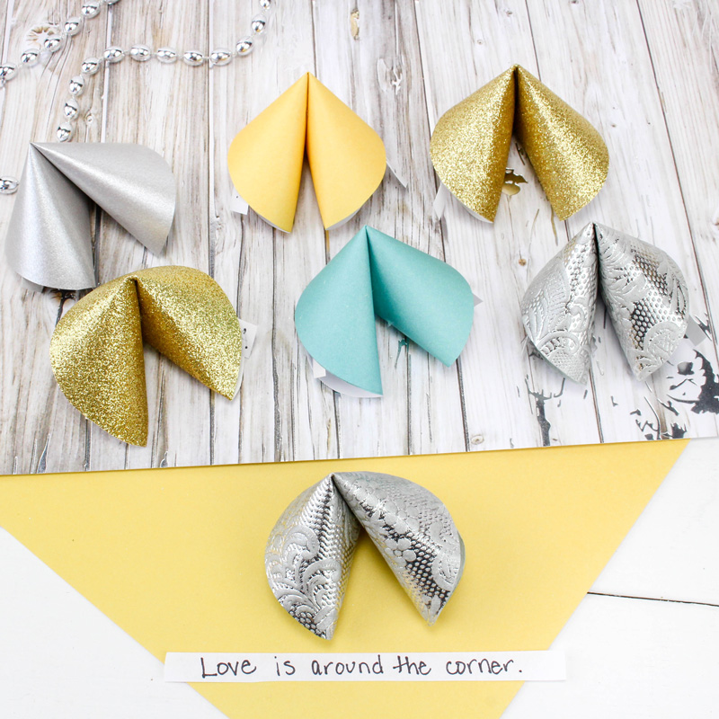 Make these super easy DIY paper fortune cookies - a super cool and simple (and cheap) DIY craft for teens and tweens. Perfect for new years eve celebrations or for any party or just for fun! #Newyearseve #newyear #papercraft #papercrafts #paper