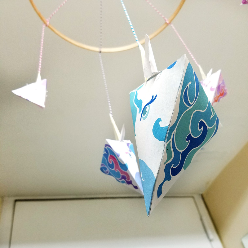 This adorable unicorn paper craft is quite unique - get the free color-in template coloring page for adults (or kids) and then assemble this super easy craft! You can turn it into a baby mobile if you'd like too, for adorable unicorn nursery decor. #unicorns #unicorn #papercraft #papercrafts #coloringpages #adultcoloring