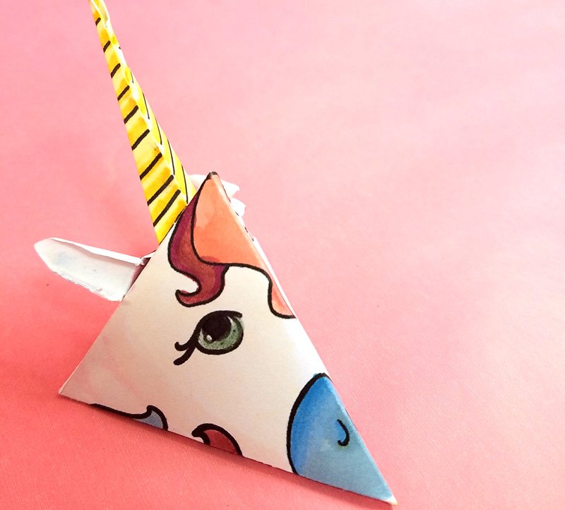 This adorable unicorn paper craft is quite unique - get the free color-in template coloring page for adults (or kids) and then assemble this super easy craft! You can turn it into a baby mobile if you'd like too, for adorable unicorn nursery decor. #unicorns #unicorn #papercraft #papercrafts #coloringpages #adultcoloring