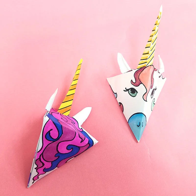This adorable unicorn paper craft is quite unique - get the free color-in template coloring page for adults (or kids) and then assemble this super easy craft! You can turn it into a baby mobile if you'd like too, for adorable unicorn nursery decor. #unicorns #unicorn #papercraft #papercrafts #coloringpages #adultcoloring
