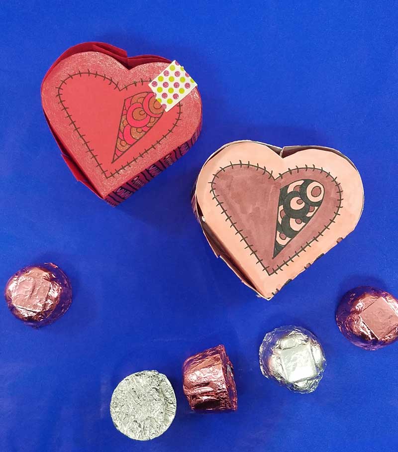 Grab the free printable template and craft this adorable heart box for Valentine's Day. This origami heart box is a sweet little DIY chocolate box and adult coloring page (perfect for big kids, tweens, and teens too!) for Valentines Day or your anniversary. #adultcoloring #papercraft #valentinesday