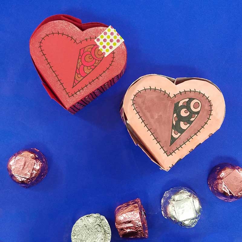 Grab the free printable template and craft this adorable heart box for Valentine's Day. This origami heart box is a sweet little DIY chocolate box and adult coloring page (perfect for big kids, tweens, and teens too!) for Valentines Day or your anniversary. #adultcoloring #papercraft #valentinesday