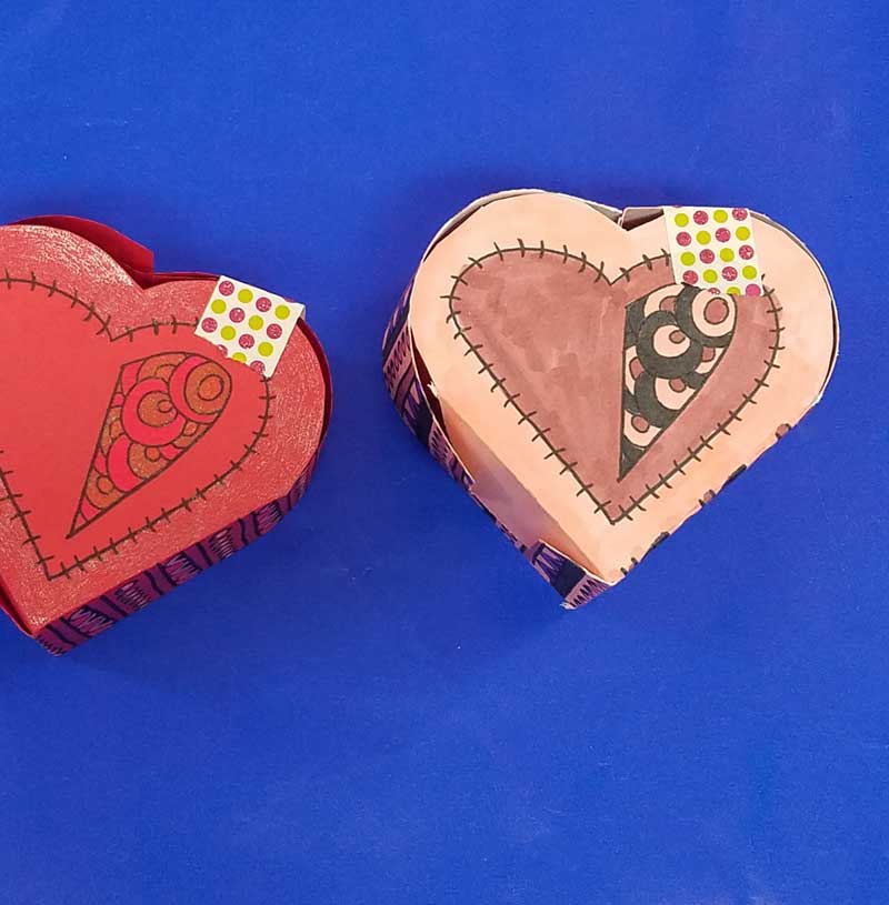 Grab the free printable template and craft this adorable heart box for Valentine's Day. This origami heart box is a sweet little DIY chocolate box and adult coloring page (perfect for big kids, tweens, and teens too!) for Valentines Day or your anniversary. #adultcoloring #papercraft #valentinesday