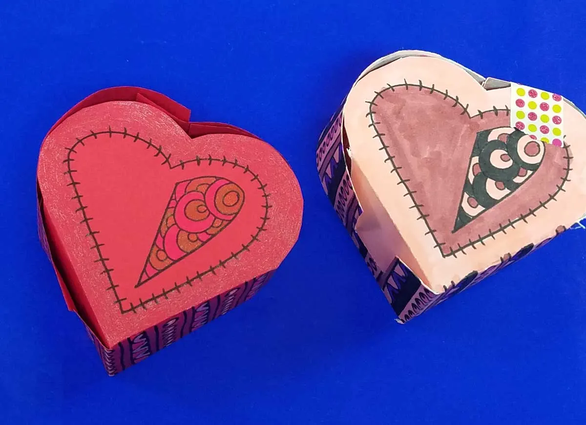 Grab the free printable template and craft this adorable heart box for Valentine's Day. This origami heart box is a sweet little DIY chocolate box and adult coloring page (perfect for big kids, tweens, and teens too!) for Valentines Day or your anniversary. #adultcoloring #papercraft #valentinesday
