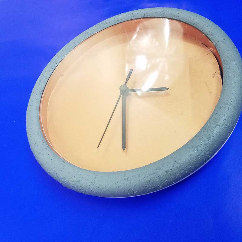 concrete and brushed metal clock makeover