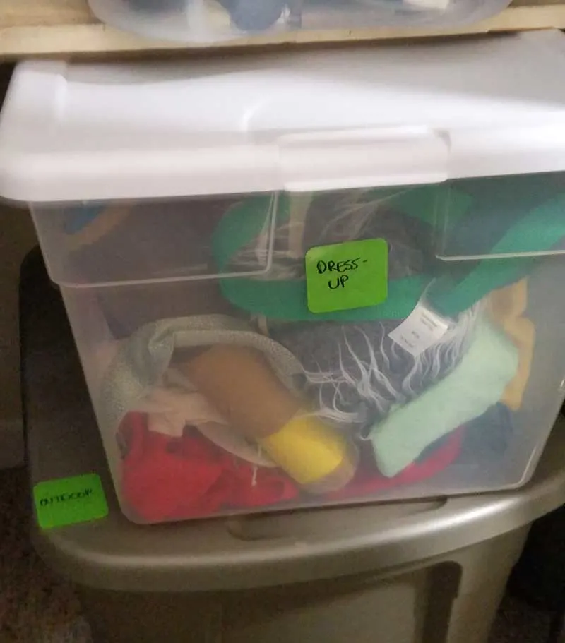 Dress-up box and outdoor toys for my organized playroom closet