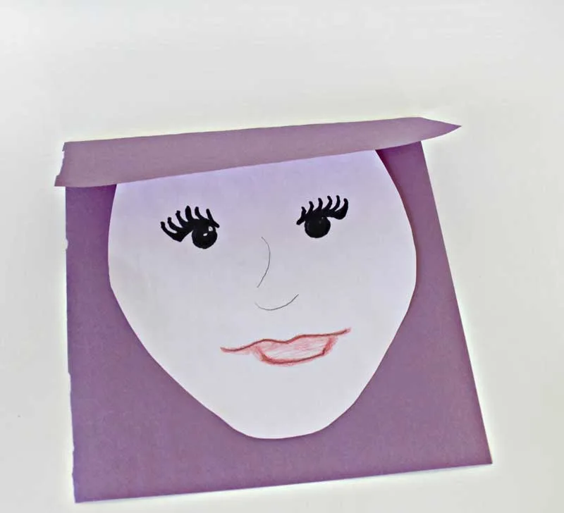 Step 3. Let your child cut out and color the face. 