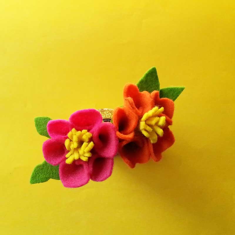 Felt flower template on yellow background