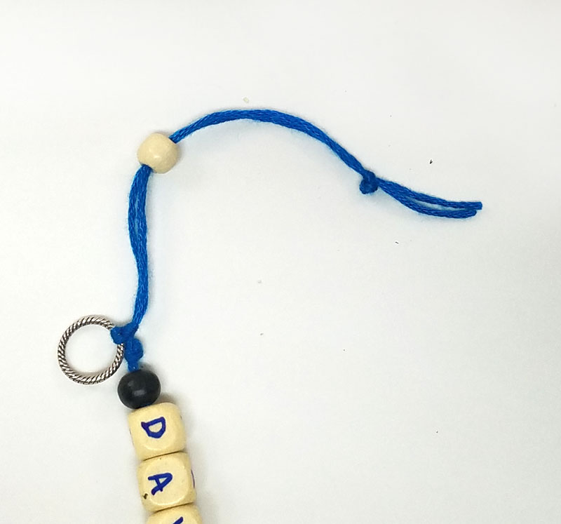 Make your own personalized keychains- summer camp craft - trim your thread