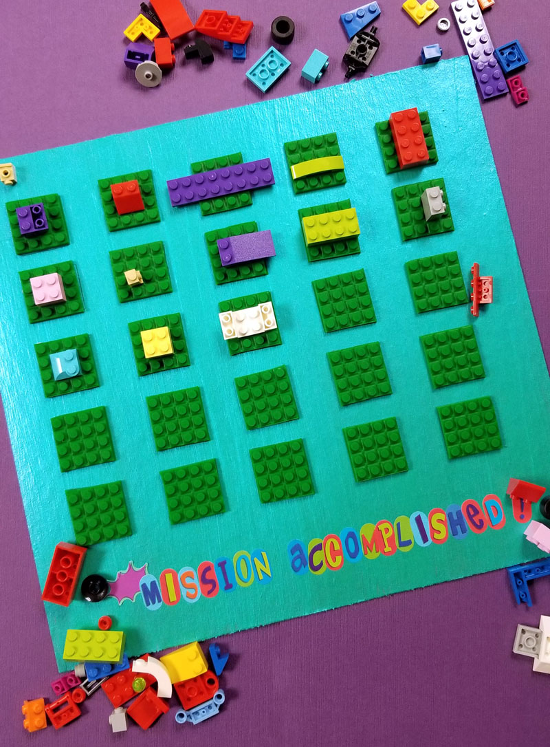 Click to find out how I made this super cool LEGO DIY reward chart for kids for my son to earn more bricks for his collection! This super cool LEGO craft has been working so well for us! #lego #legofan #kidscraft