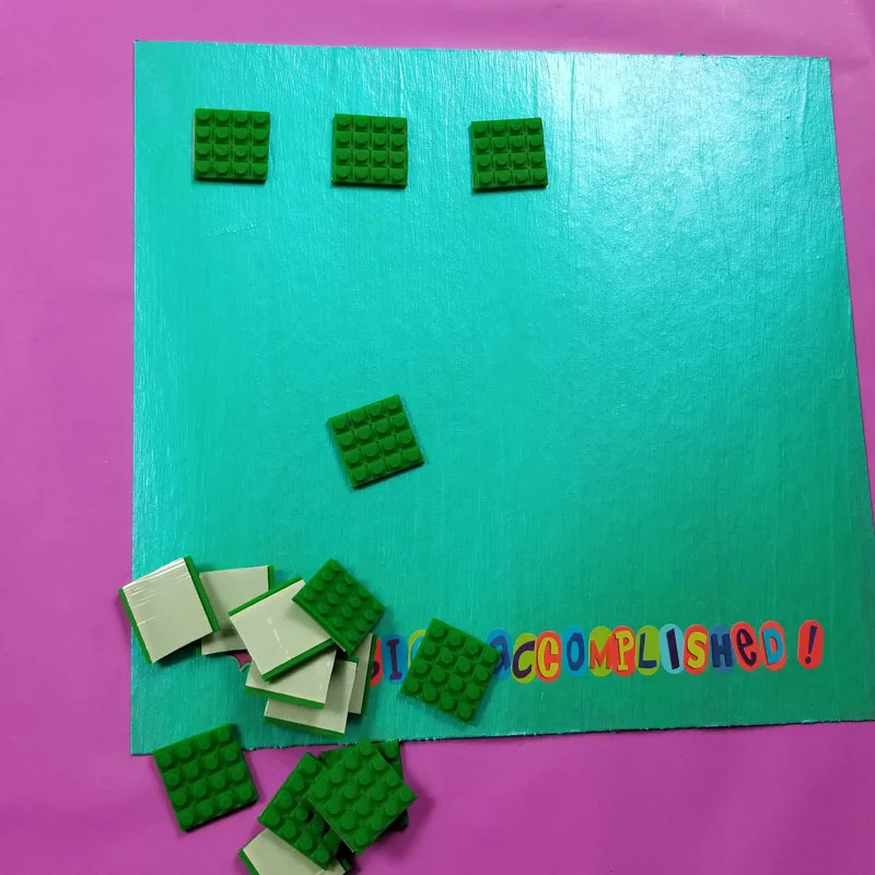 add squares of toy block tape to your DIY reward chart for kids