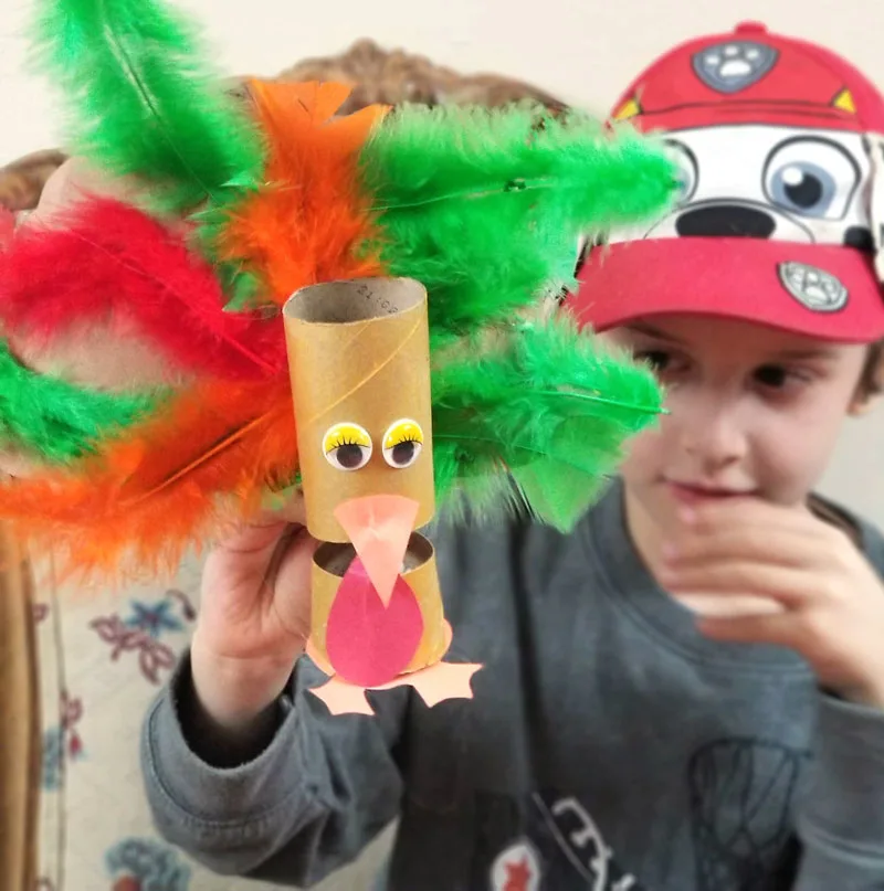 Thanksgiving crafts for kids: make a DIY Turkey puppet using a toilet paper roll