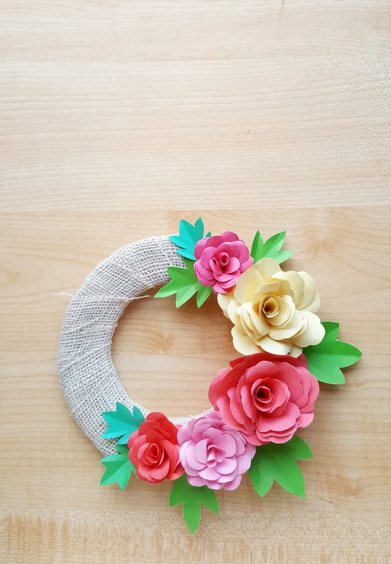 Learn how to make your own DIY paper roses with a free printable paper flower template