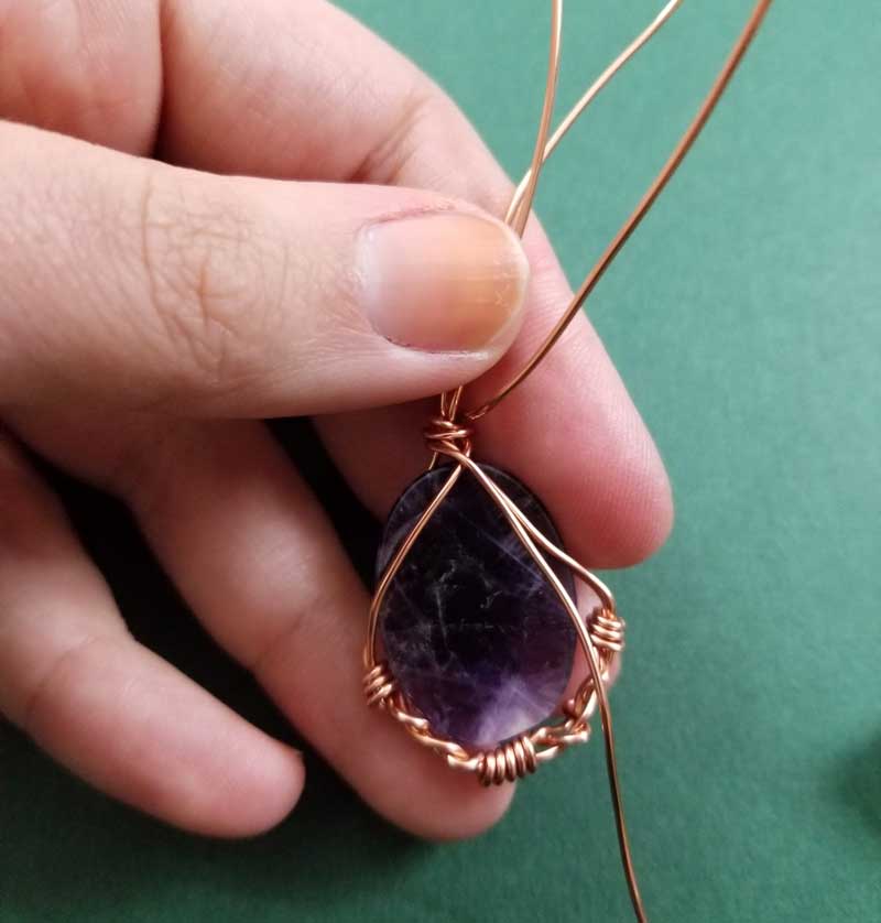 Beautiful amethyst stone wire wrapped in silver oxidized wire.