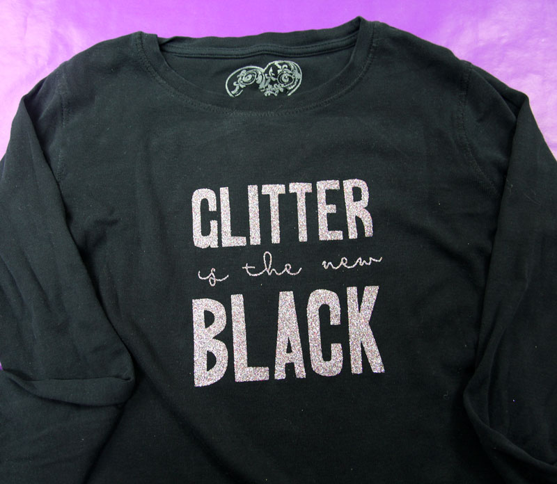 Does anyone know how to achieve this black vinyl on black shirt