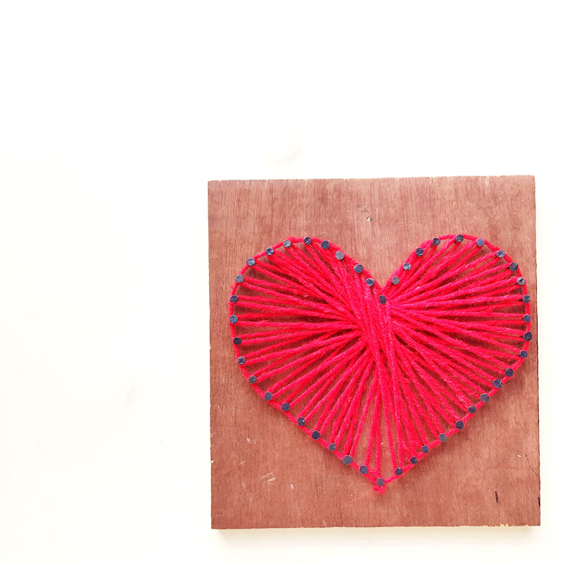 Heart string art design on Craiyon